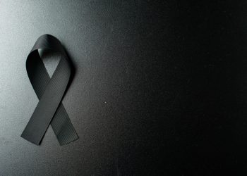 Top View Black Bow As Mourning Symbol Dark Wall